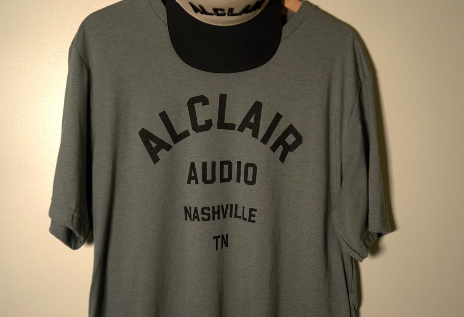 Alclair Nashville Varsity Shirt in Sage Green - Wall BG 2